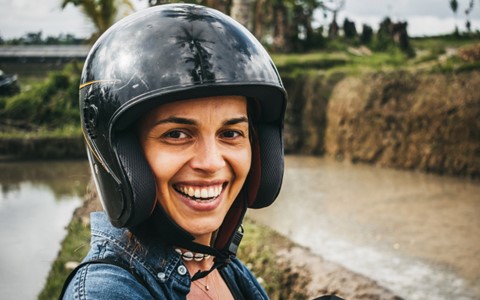 A woman wearing a helmet