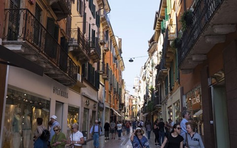 A Sicilian street busy with tourists