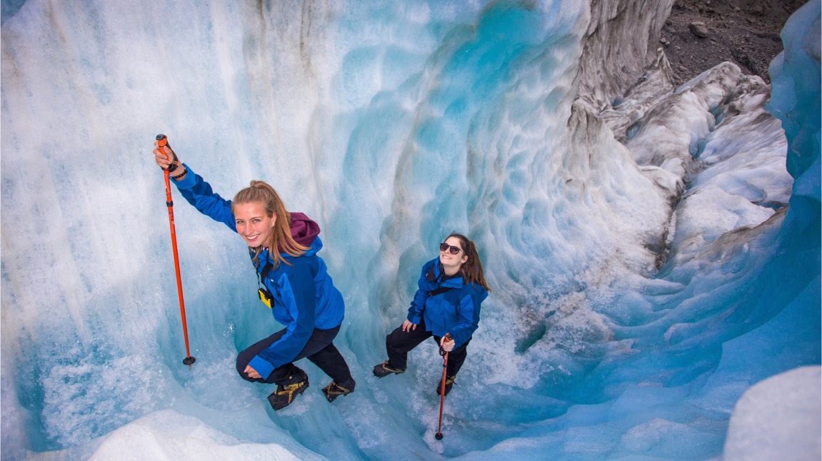 People hiking the Franz Josef glacier